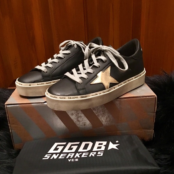 black and gold golden goose sneakers